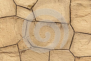 Block pattern of brown stone cladding wall tile texture