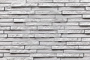Pattern of white stone cladding wall tile texture and seamless background