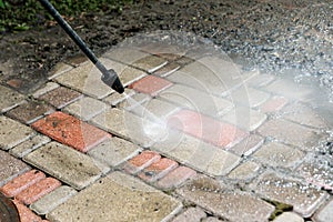 Block paving cleaning with high pressure washer