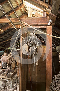 Block and tackle in wooden attic