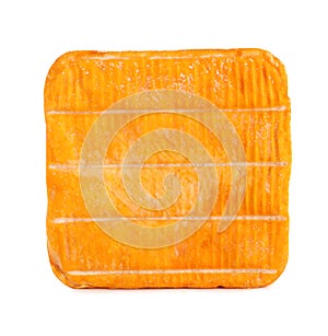 Block of tasty munster cheese isolated