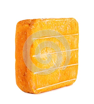 Block of tasty munster cheese on white