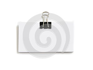 Block of white cards attached with paperclip