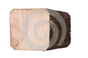 A block of wood with a visible texture after cutting with a chainsaw. Material used in a carpentry workshop