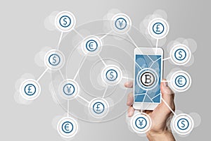 Blockchain and bitcoin technology and mobile computing concept on grey background