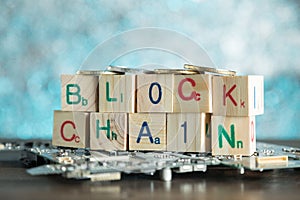 Blockchain cryptocurrency concept. Wood blocks say block chain w