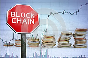 Blockchain road sign on economy background with graph and coins