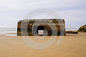 Blockhaus german army in sand french beach coast photo