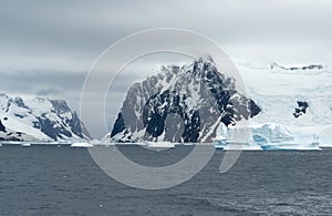 Blocks Of Ice Floating At The Entrance Of Lamaire Channel In Antarctica