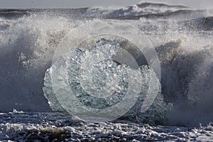 Blocks of ice from the glaciers break up and is washed ashore