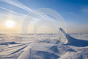 Blocks of ice gleaming in the sun, snow, frost