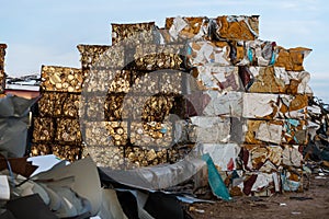 Blocks of rusty compacted cans and other metals in a scrap yard near Sierra de Fuentes, Extremadura, Spain