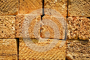 Blocks of shell rock are stacked. Material for building construction. Wall Textured Background.