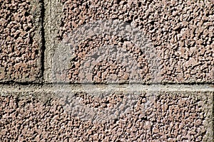 Blocks of a wall in the sun photo