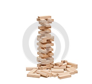 Blocks wooden game jenga, towel isolated on white background