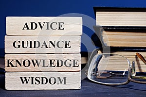 Blocks with words Advice Guidance Wisdom Knowledge