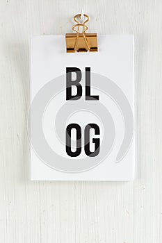 Blog Clipboard, conceptual communication. on white wooden background