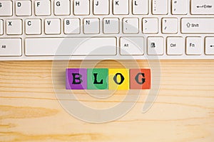 Blog text on wooden block