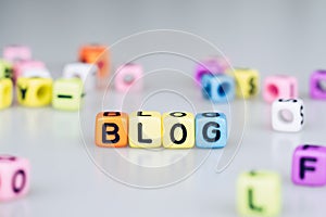 BLOG word text written on colorful cube with bokeh cube word block background