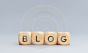 BLOG word on wooden cube blocks on gray background