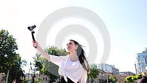 Blogging. Woman Filming Video On Camera On Street