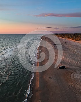 Blokhus Beach in Denmark during sunset.