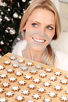 Blond angel with cookies