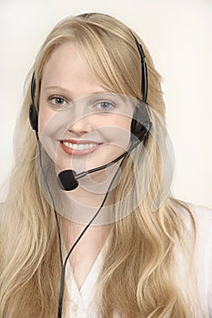 Blond beautiful girl in the Call center