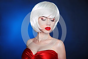 Blond bob hairstyle. Fashion Beauty Girl. Makeup. White Short ha