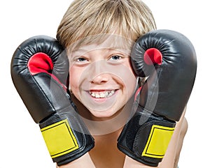 Blond boy with boxing gloves