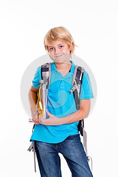 Blond boy with satchel and books