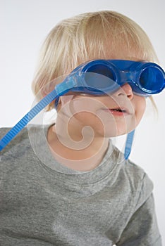 Blond Boy Wearing Swim Goggles