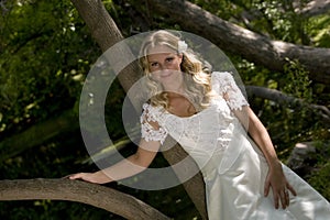 Blond bride in countryside