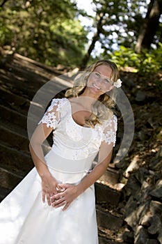 Blond bride in white dress