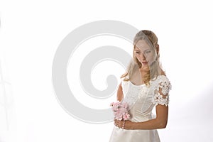 Blond bride in white dress