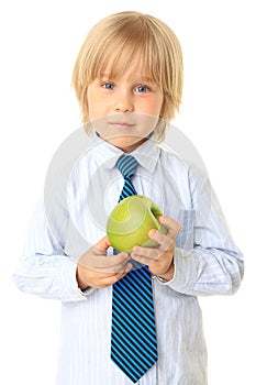 Blond child holding fruit. Series