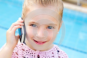 Blond child little girl talking mobile phone