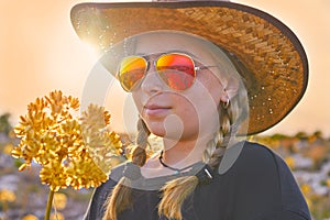 Blond country girl with sunglasses