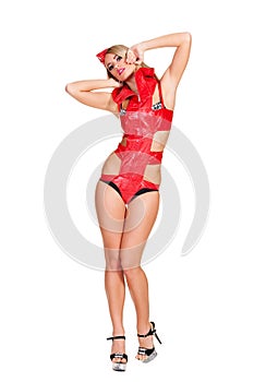 Blond dancer in red isolated on white
