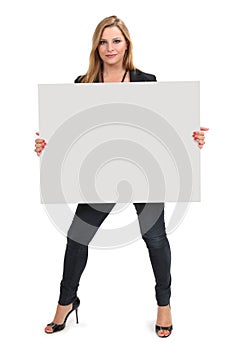 Blond female holding large blank sign