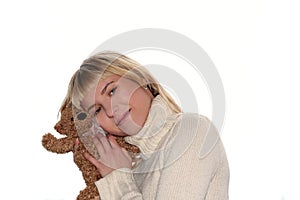 Blond female with teddy bear