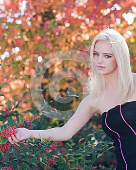 Blond girl in autumn colors