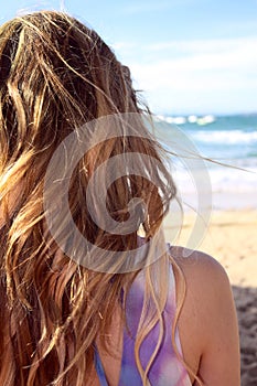 Blond girl on beach