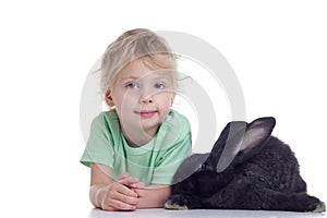 Blond girl and black rabbit