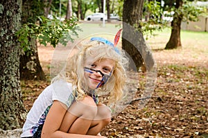 Blond girl with facepainting