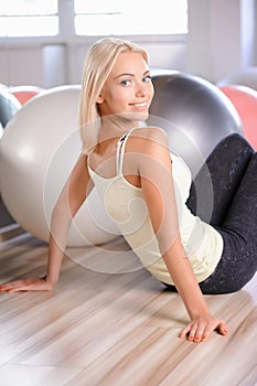 Blond girl with a fitness ball