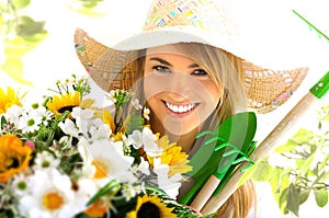 Blond girl and gardening tools