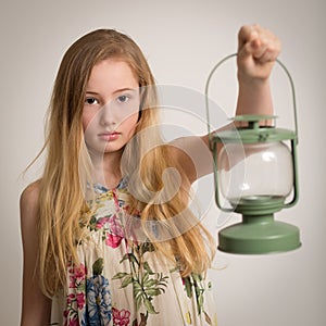 Blond Girl Holding a Lantern.