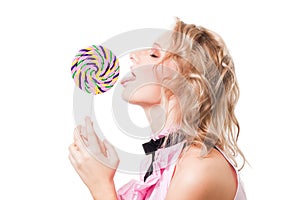 Blond girl lick lollipop