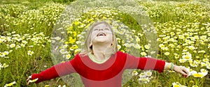 Blond girl open arms spring meadow daisy flowers